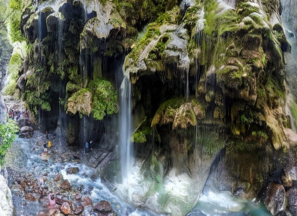 Umbrella waterfall in a canyon with a waterfall in the background