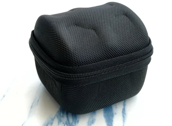 a black case with a zippered pouch on it