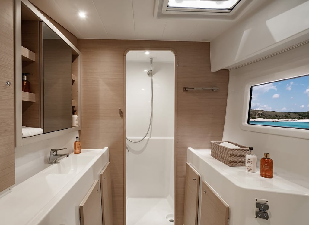 Modern private bathroom inside Kephas luxury catamaran in Costa Rica