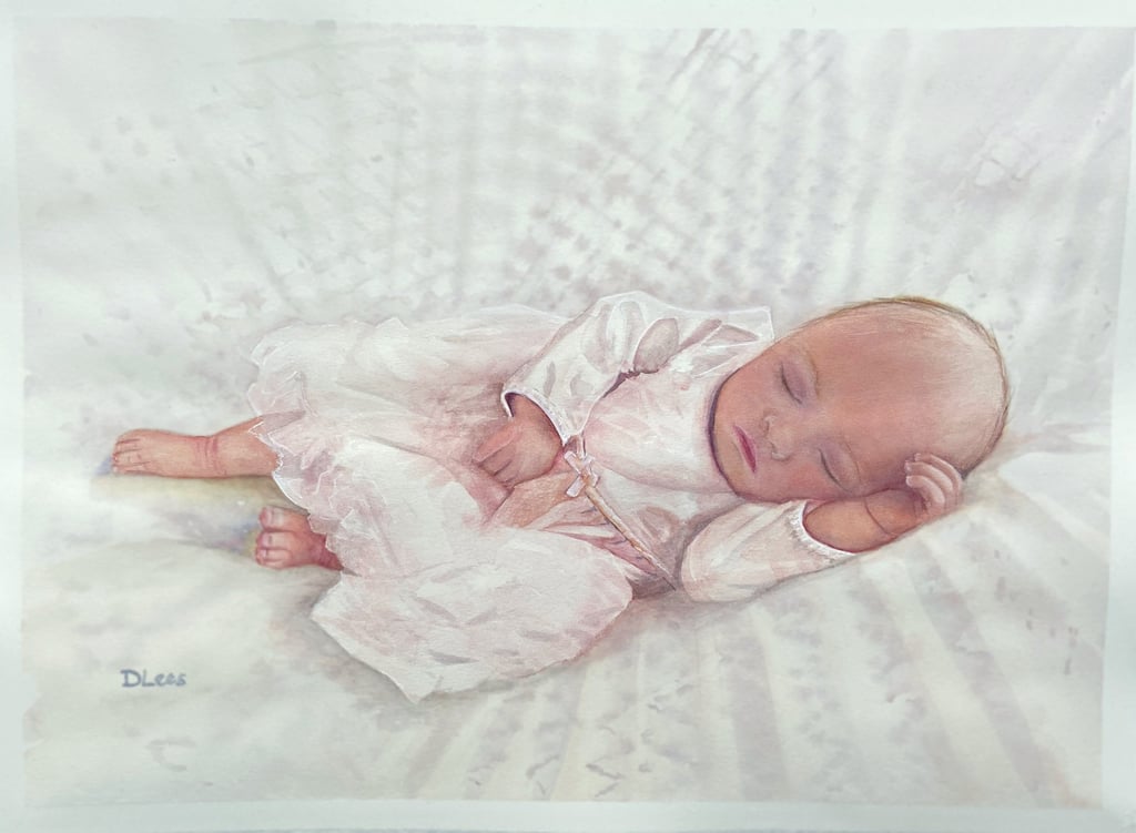 Watercolour of a baby sleeping on a blanket