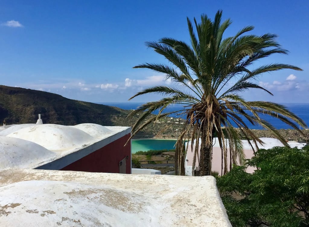 Traditional house in Bugeber with lake view, green hills and clear sky
