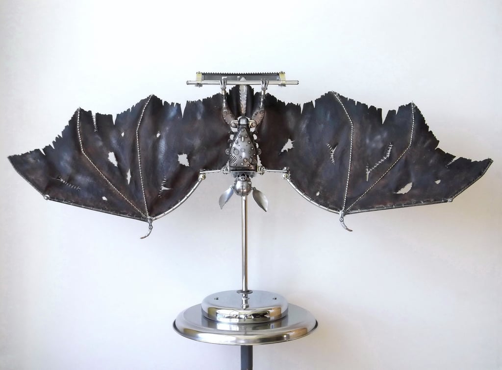 Igor Verny steampunk bat sculpture on pedestal, metal sculpturel