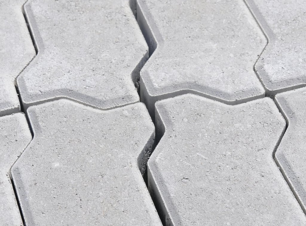 a close up of a tile floor with a cat sitting on the floor