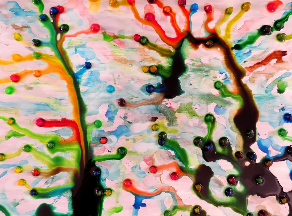 Streaks of colored paint from melting ice