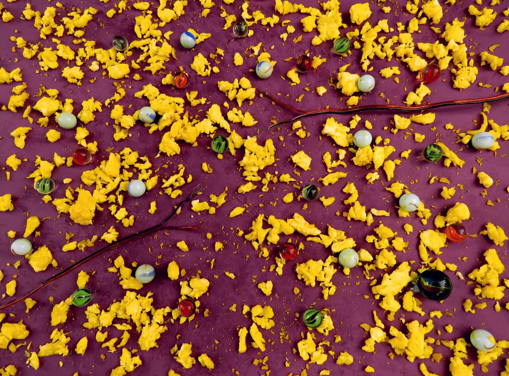 Splintered Blog 8; scrambled eggs, marbles and frayed wires on a purple background
