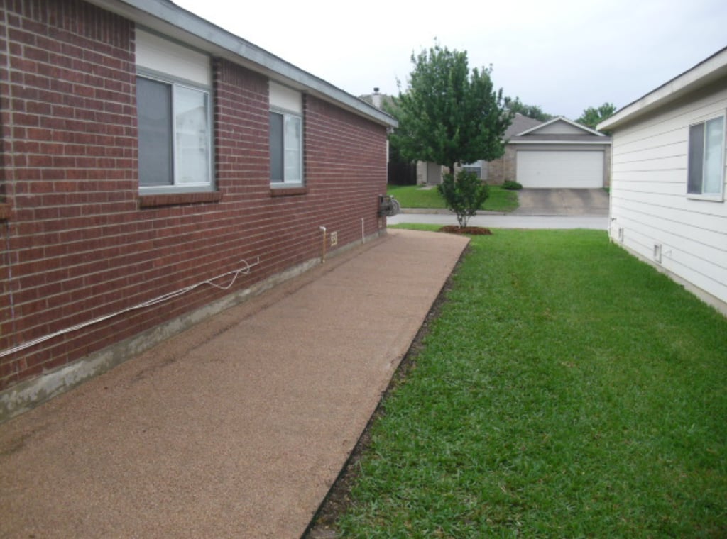 decomposed granite walkway on side of house 