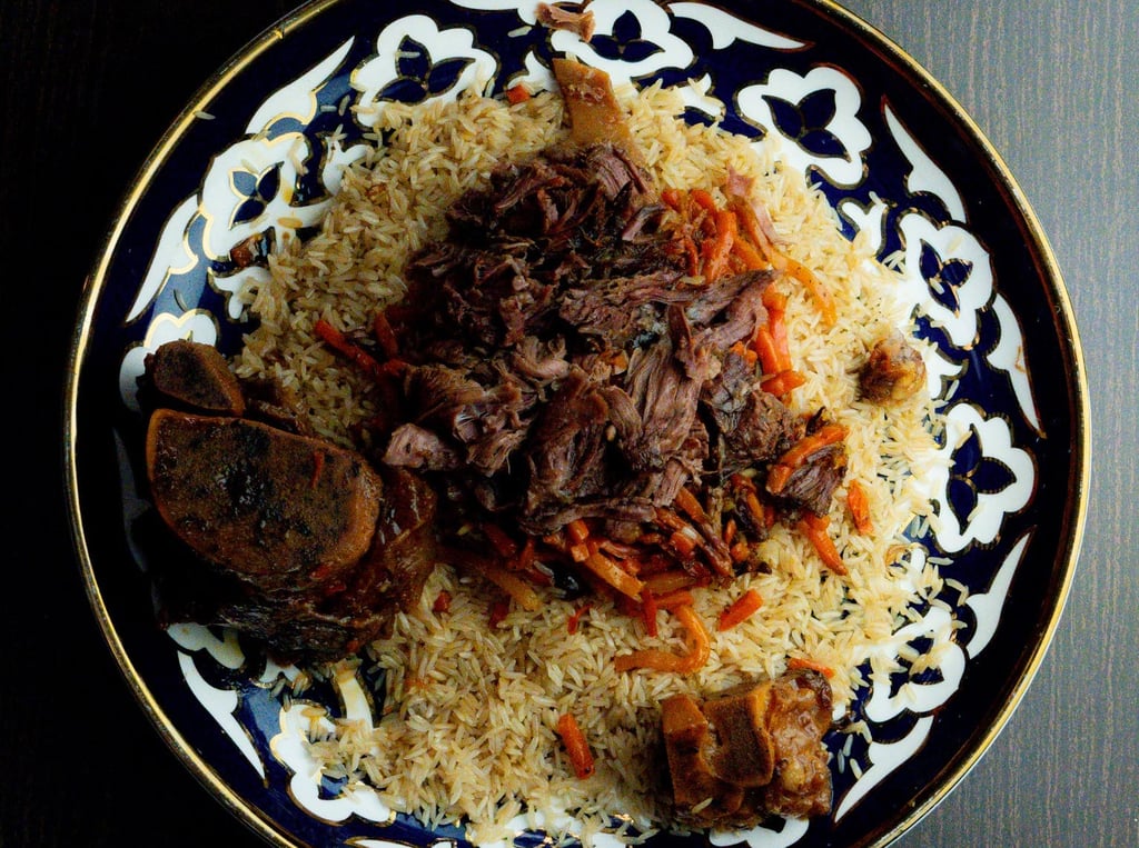 a plate of food with meat and vegetables