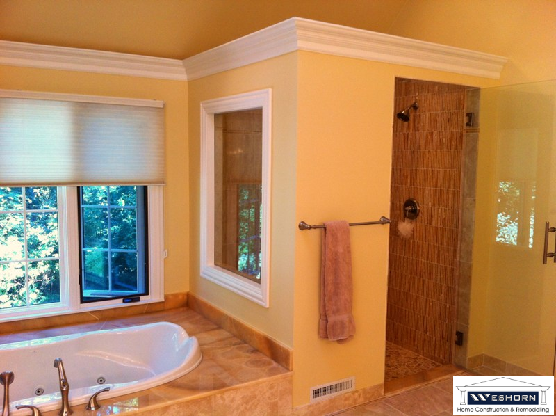 Bathroom design and remodeling project with modern tile, and fixtures in Long Grove
