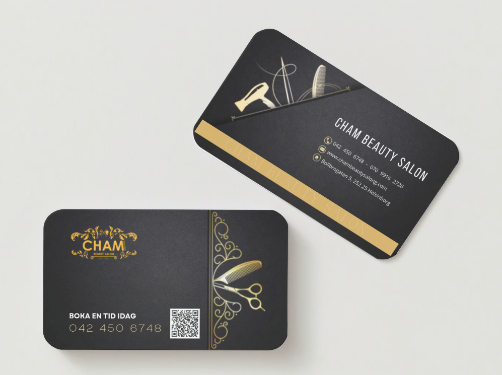 a business card with scissors and scissors on it