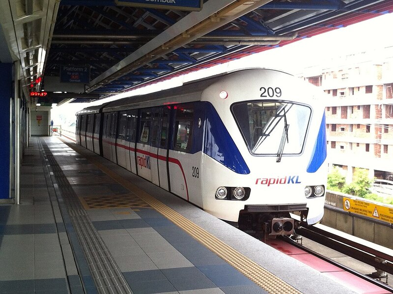  Light rail train at elevated station representing transit connectivity
