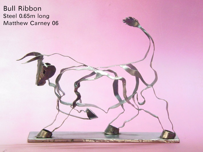 a sculpture of a bull made with ribbons of steel