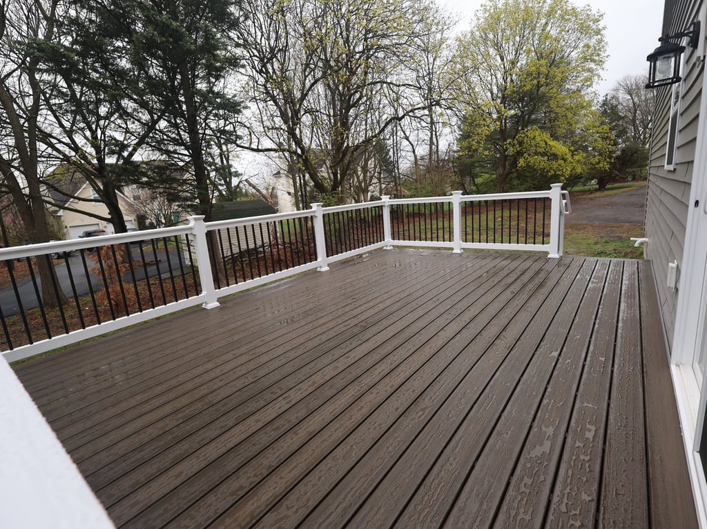 Trex composite decking with vinyl railings and aluminum balusters