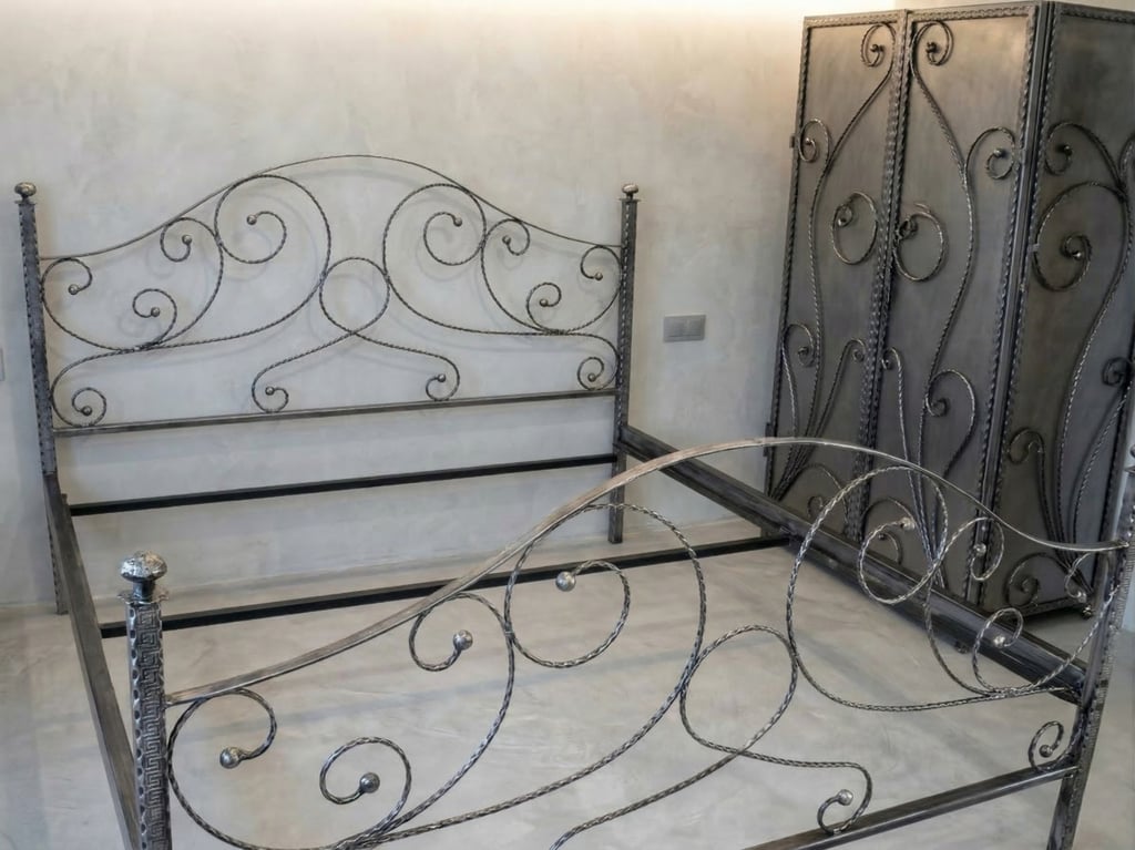 Elegant wrought iron bed frame and matching scrollwork wardrobe in a modern minimalist bedroom.
