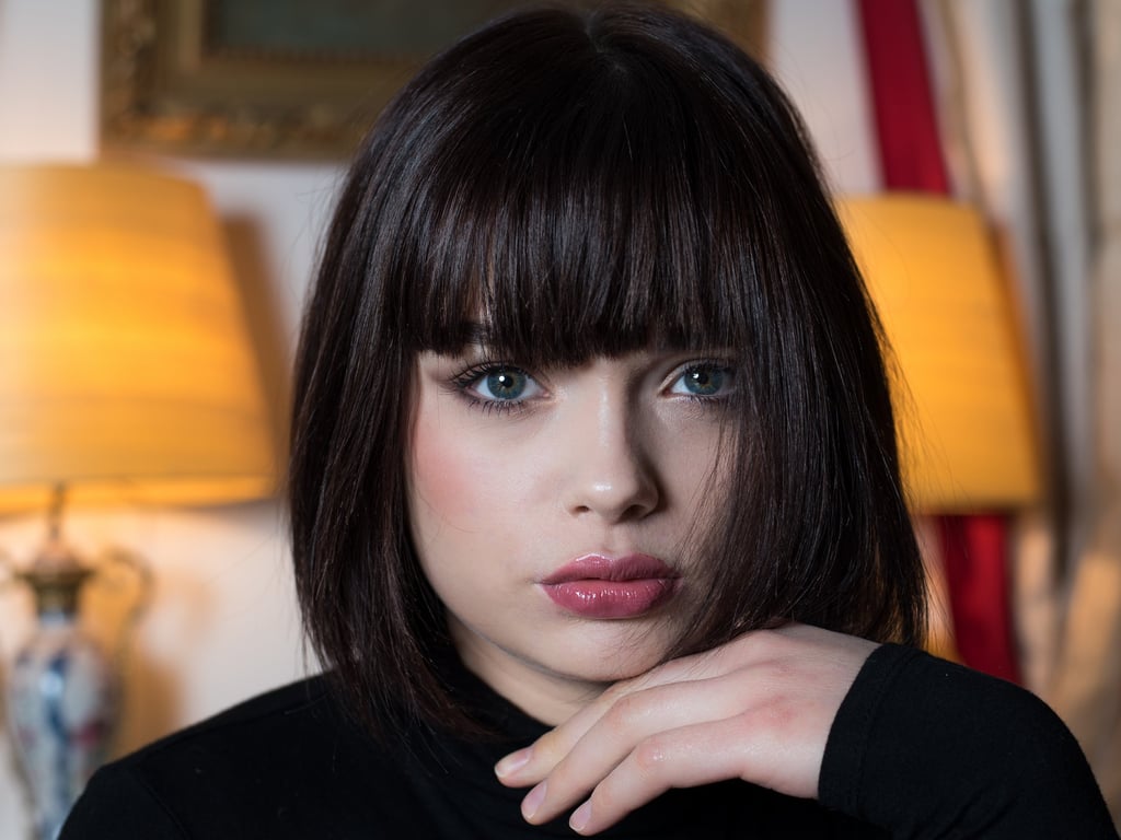 a woman with a black shirt and a black shirt