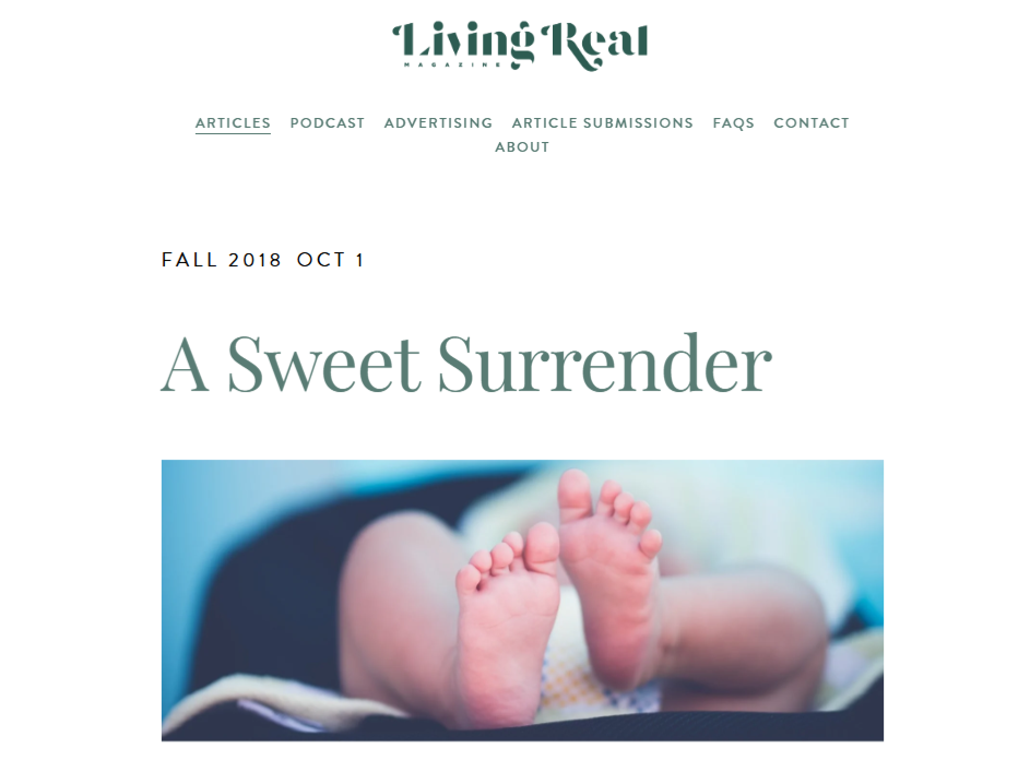Close-up of newborn baby feet for the Living Real Magazine article A Sweet Surrender.