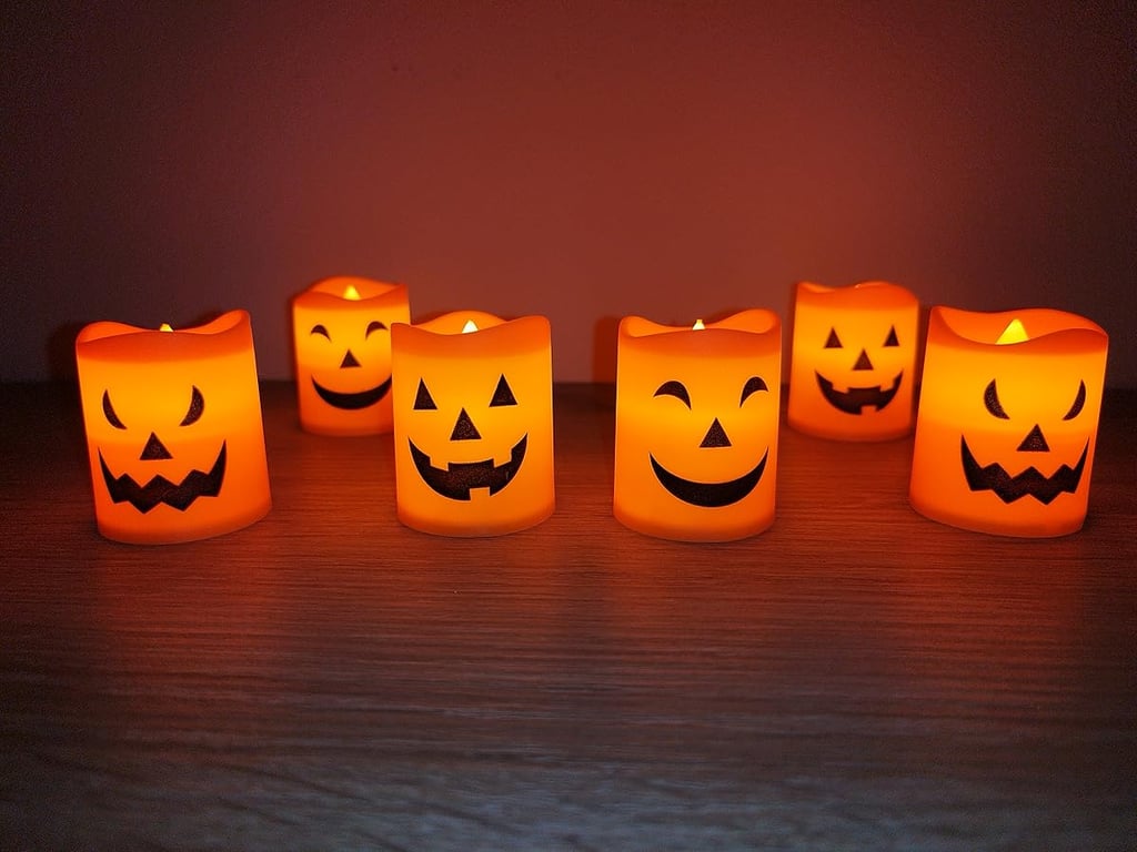 6 mini flameless Jack-o'-Lantern tea light candles for Halloween home decoration with LED lights