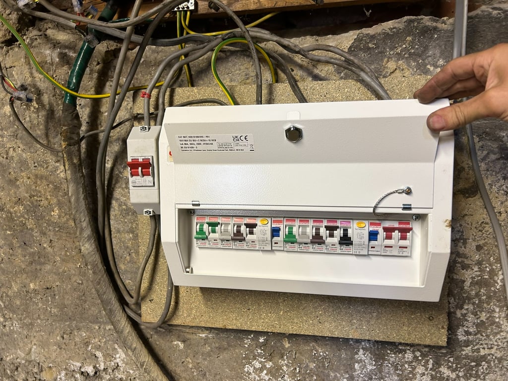 All new consumer unit with 10 circuits. Isolation switch also added.