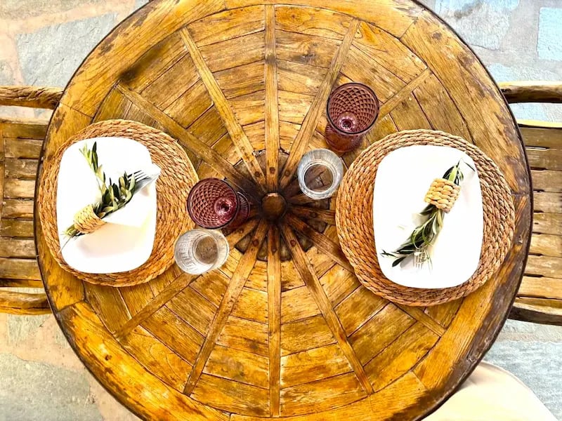 Elegant villa dining table set for private chef experience in Naxos