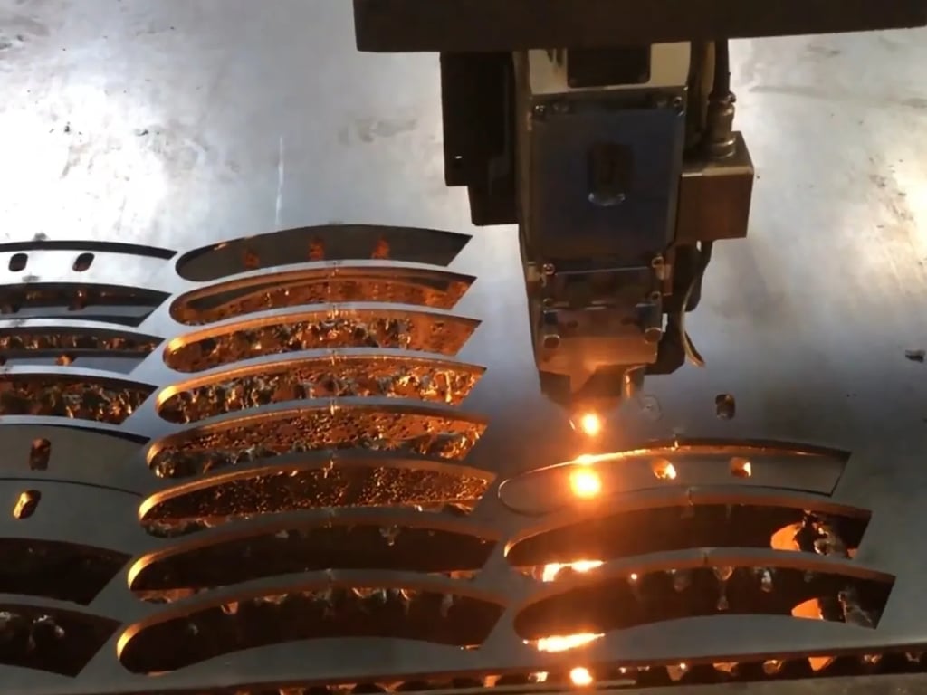 Laser cutting process used to fabricate precision components for strength machines
