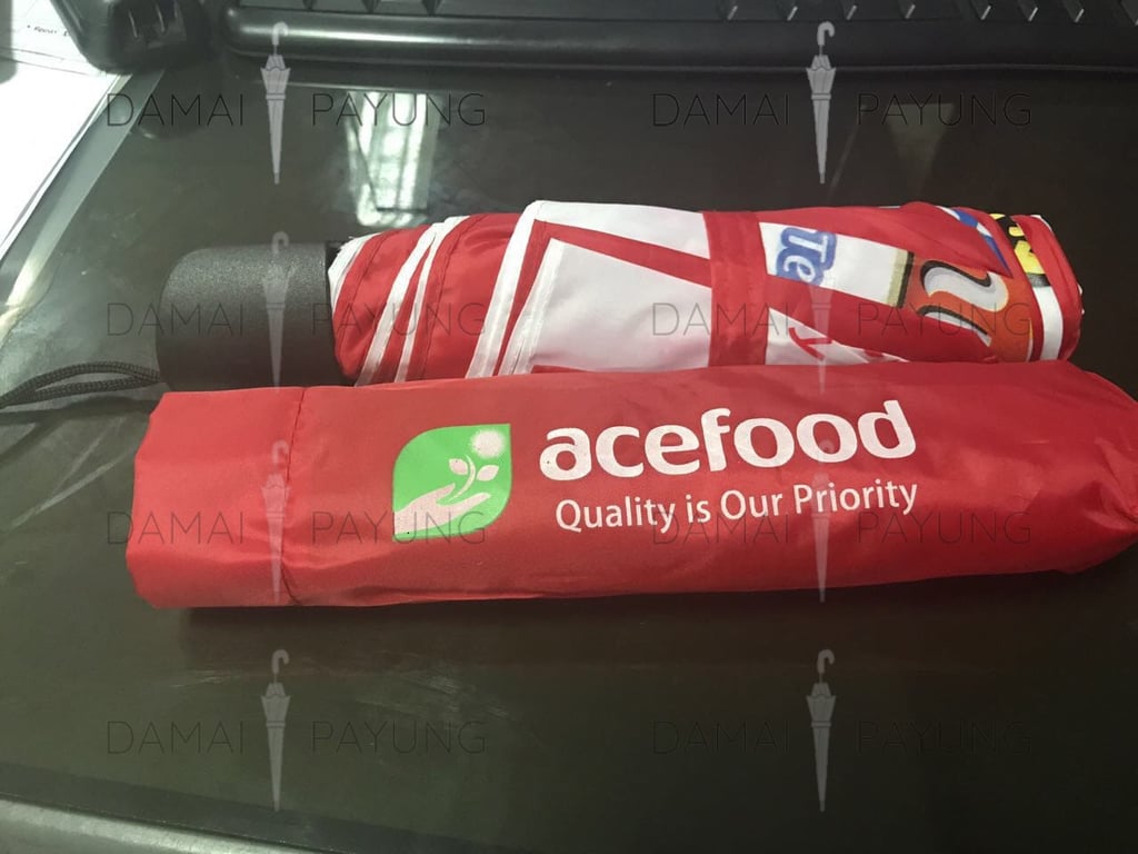 Payung promosi polos lipat merah putih acefood