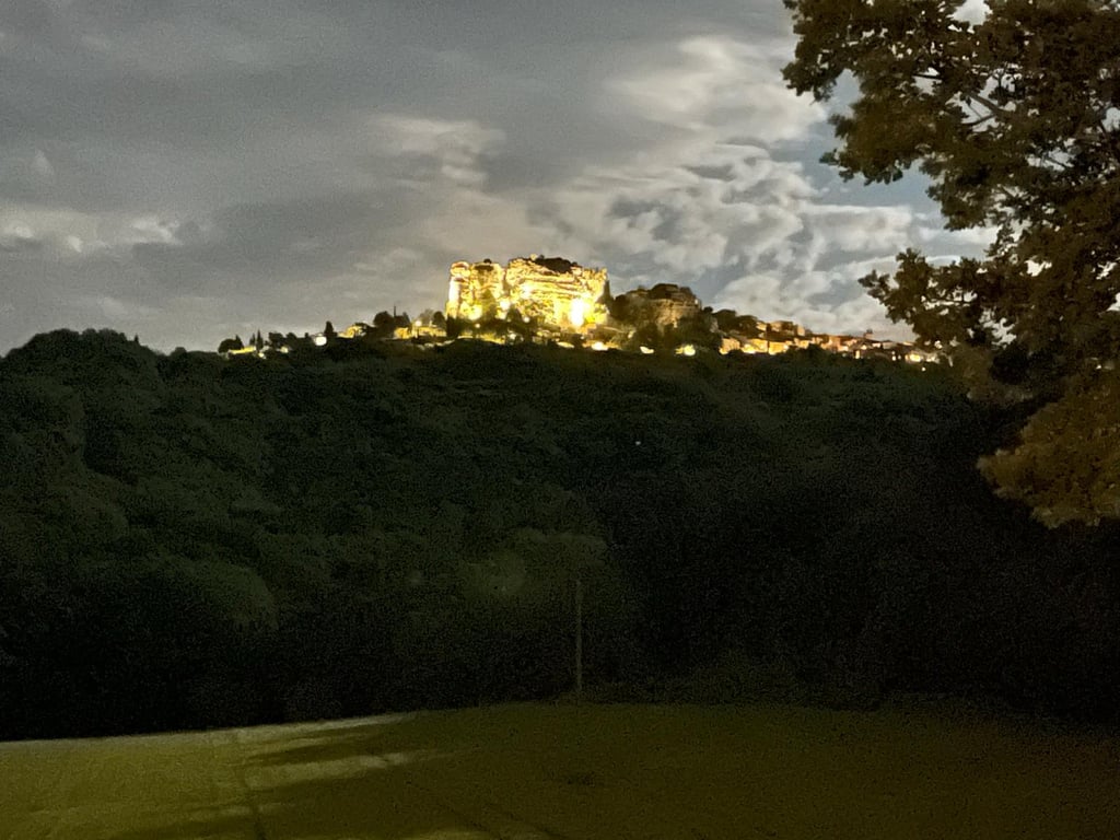 Saignon Rock illuminated at night