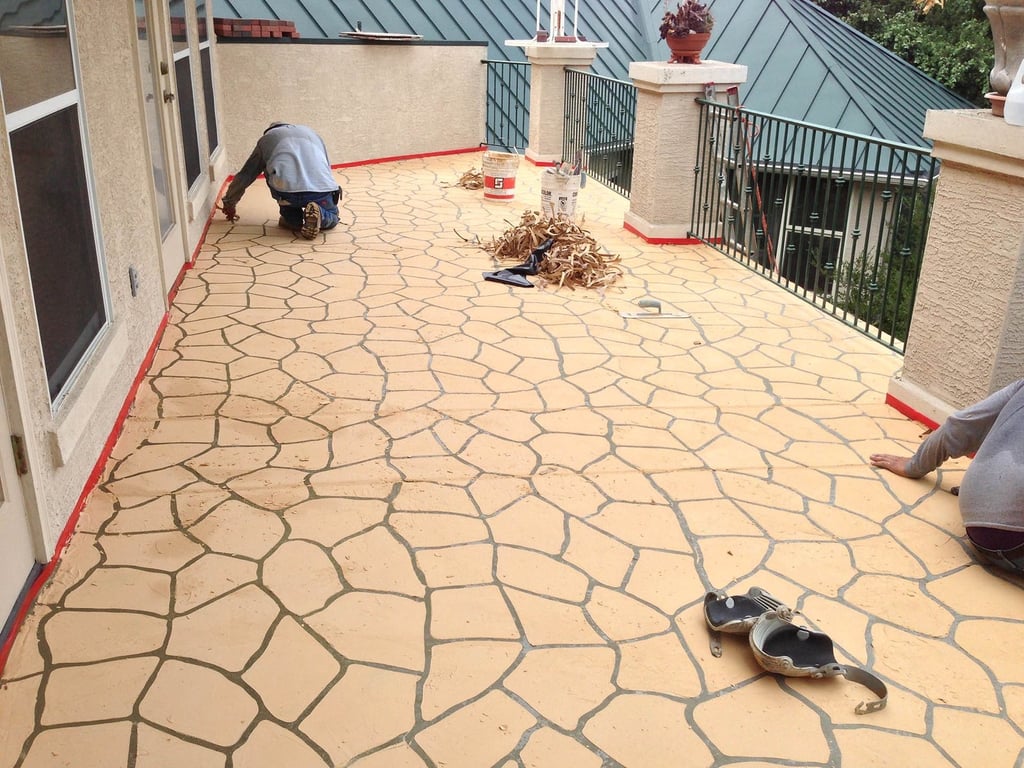 Stenciled concrete surface on baloney.