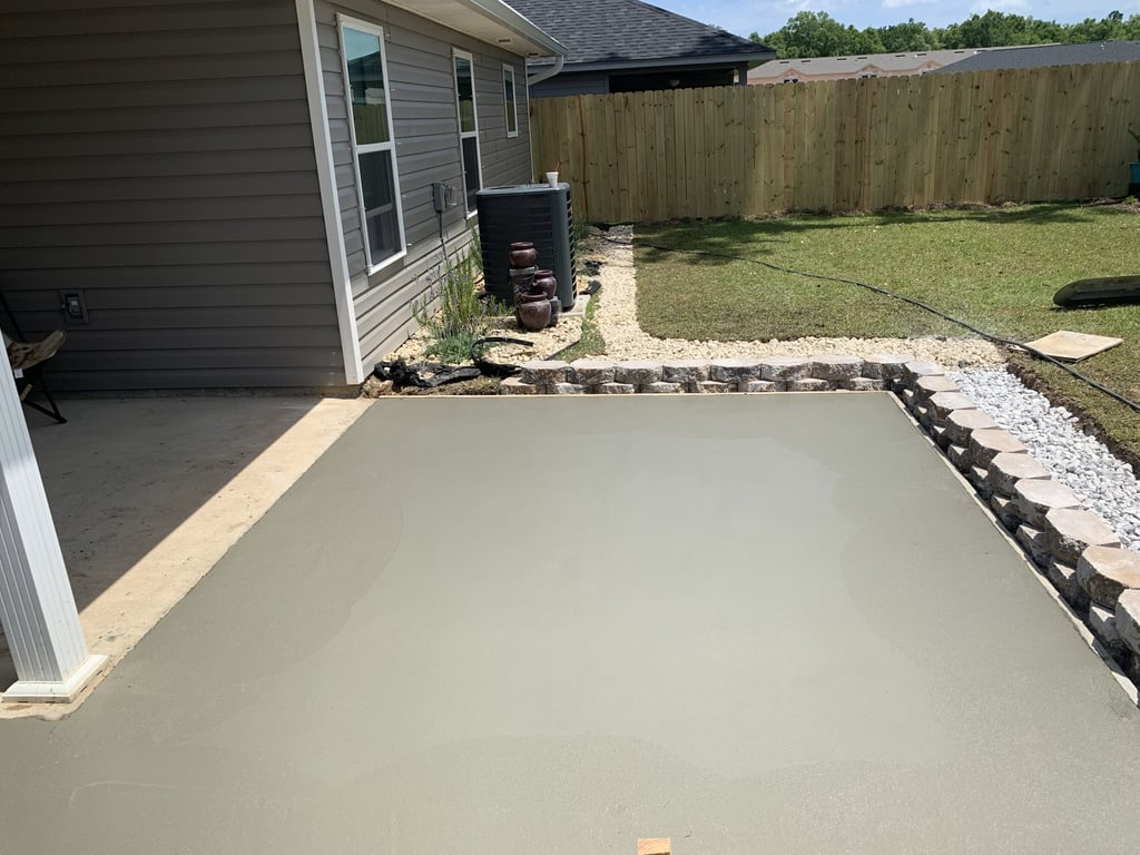 Concrete patio installation in Navarre FL for backyard outdoor living space