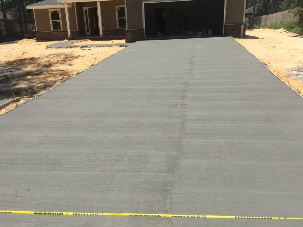 Concrete driveway installation in Navarre FL with smooth finish and clean edges