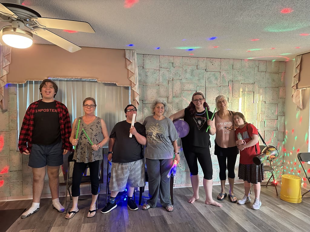 Bucket drum workshop group photo with everyone, smiling