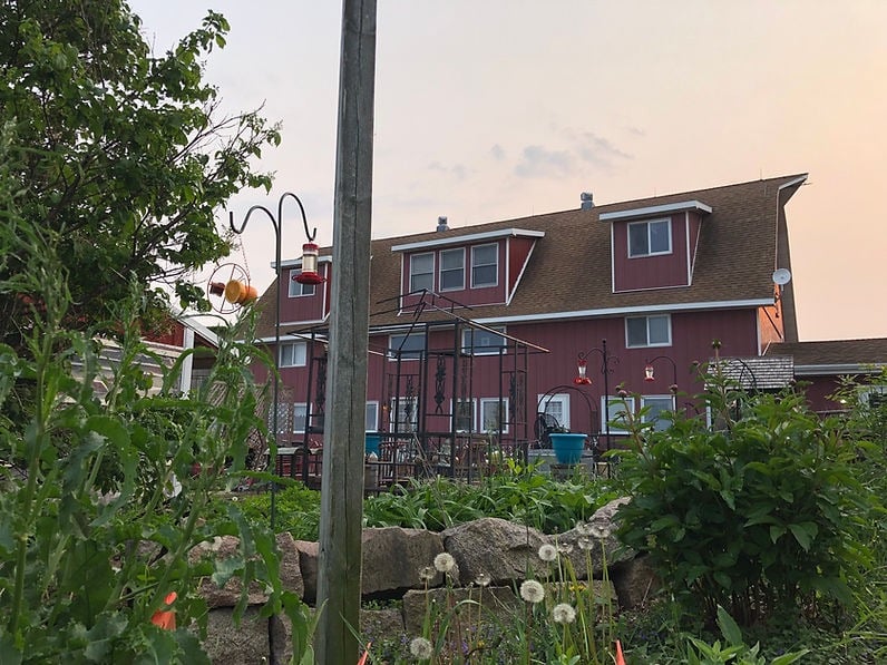 A photo of India’s grandparents’ farm and business