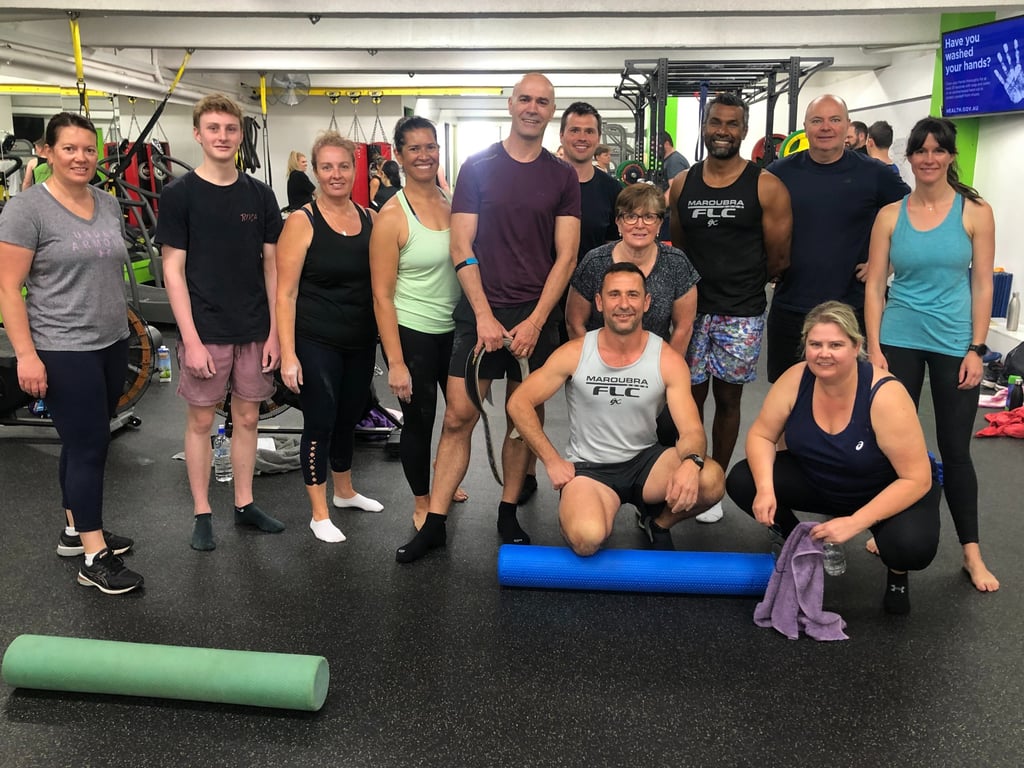 happy member with personal trainer at 6X Training in Maroubra