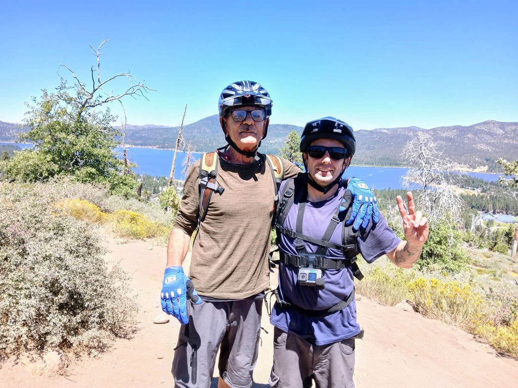 dad and son out mountain biking wearing same mtb shorts