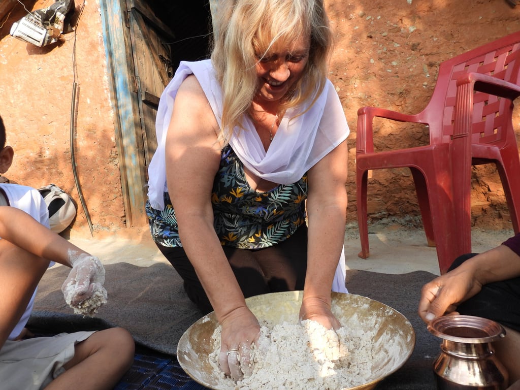 tourist making chapatis