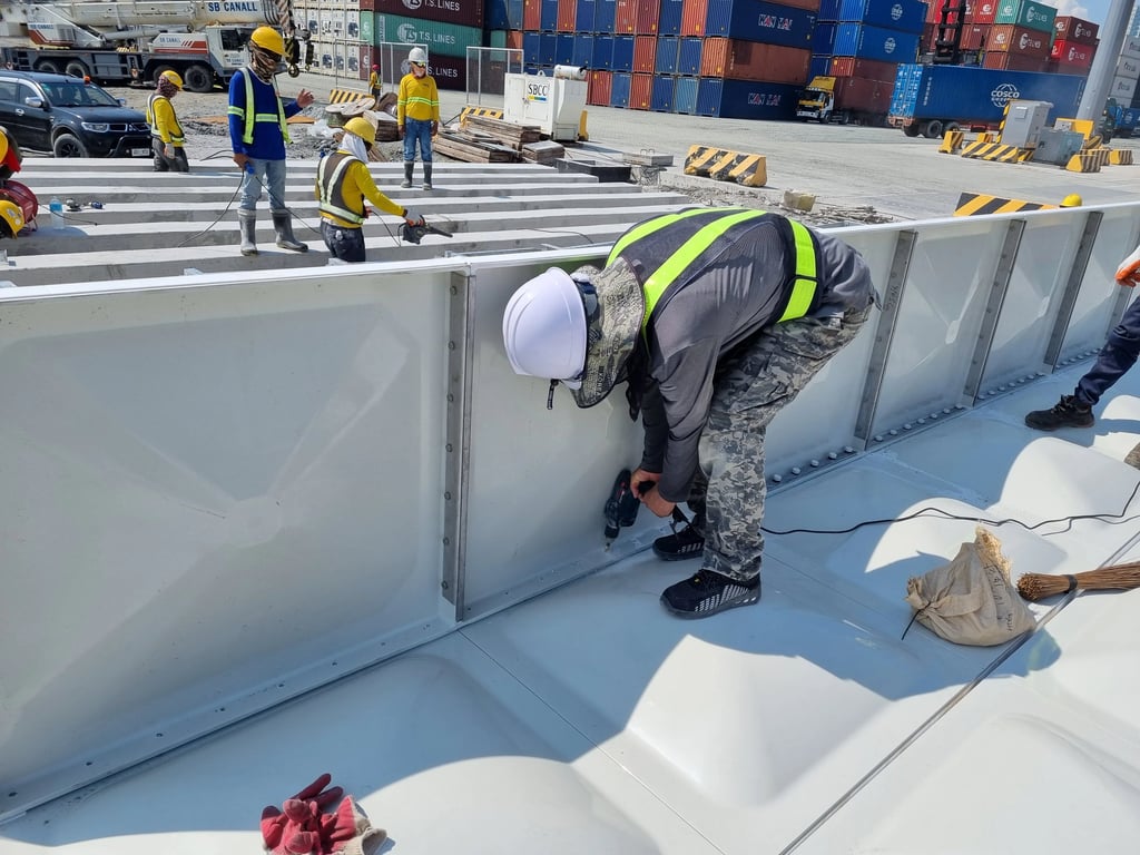 GRP Sectional Water Tank Side Panel Installation from above the Bottom Panel