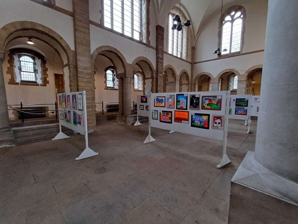 Large event showing paintings by children affected by war
