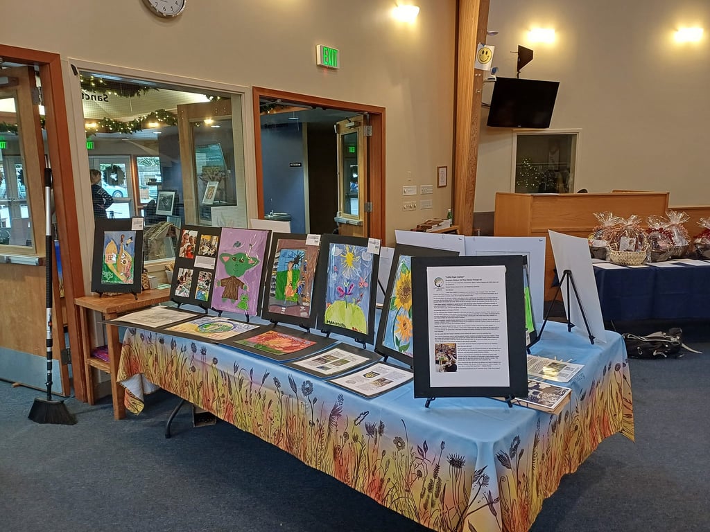 exhibit of paintings by children displaced by war in Oregon US