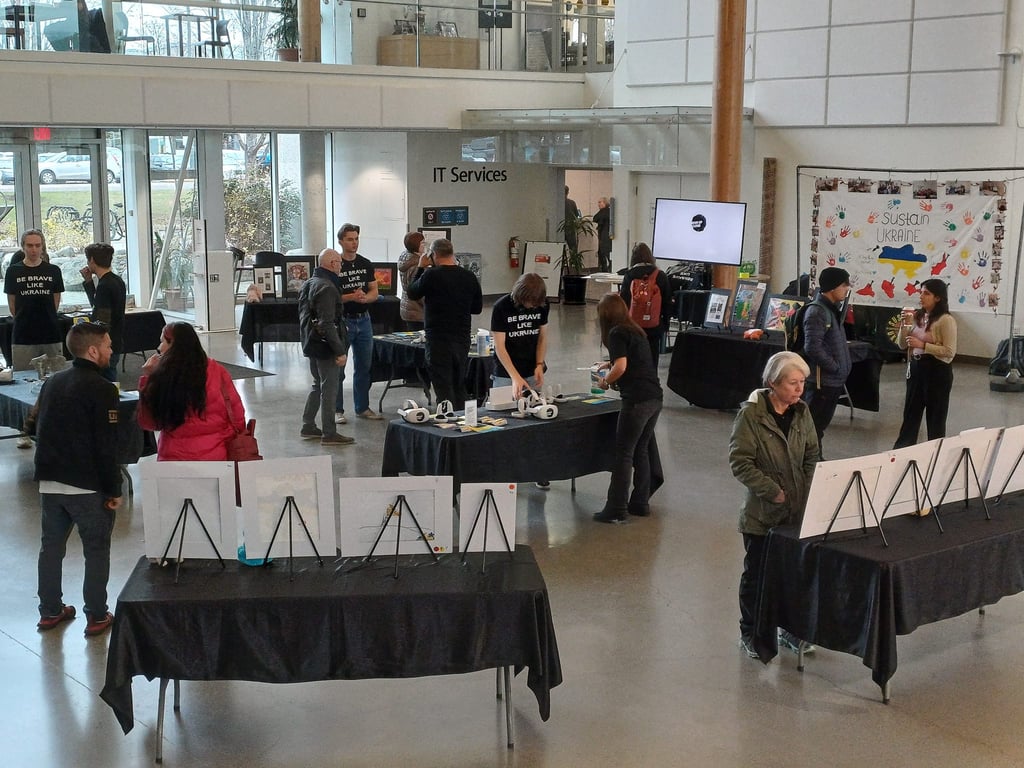 event showing paintings by children displaced by war in Canada