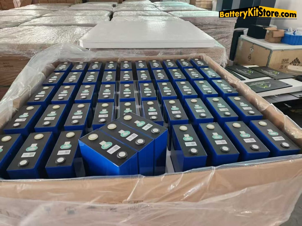 boxes of LiFePO4 prismatic battery cells in a warehouse