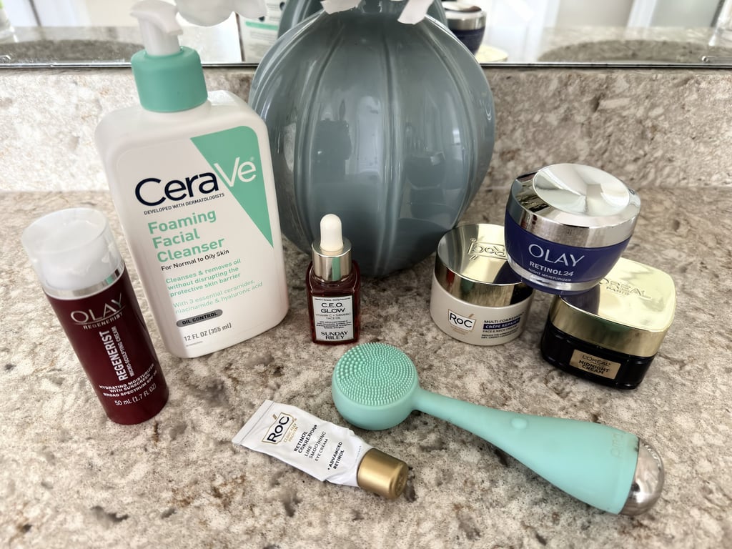 Bathroom counter with skincare products, vase, and flowers, representing a peaceful skincare routine