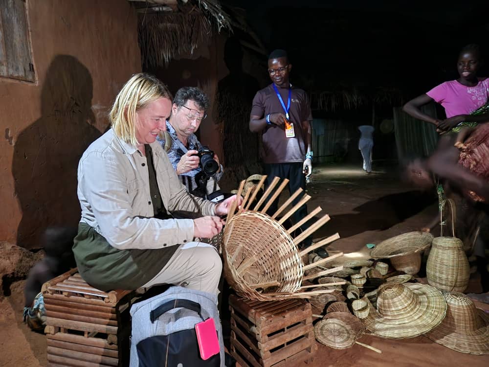 Tourist doing basket Weaving activity in Senegal