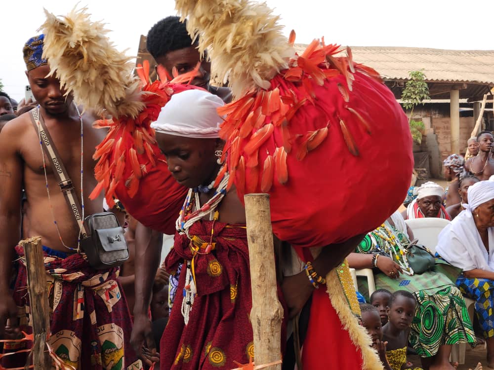 A young Beninese Voodoo Adept in Trance during the Voodoo Festival in Benin