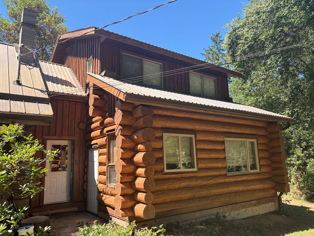 Log home in Courtenay after restoration by Embassy Restorations Vancouver Island