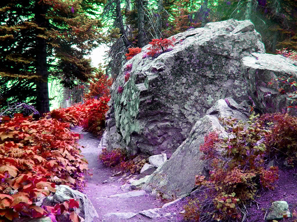 Boulders with hiking trail and inverted colors