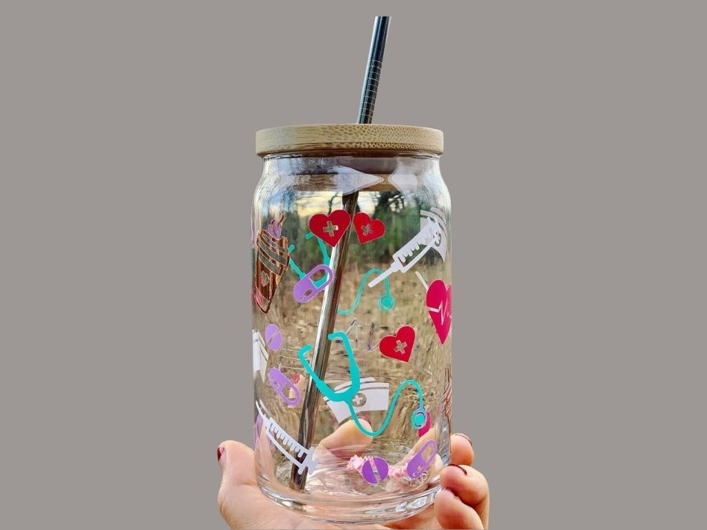 soda glass with bamboo cap with various stickers