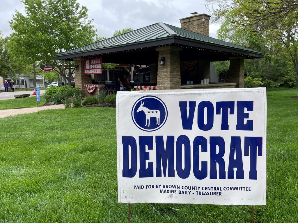 Yard sign reading Vote Democrat in front of downtown Nashville pavilion