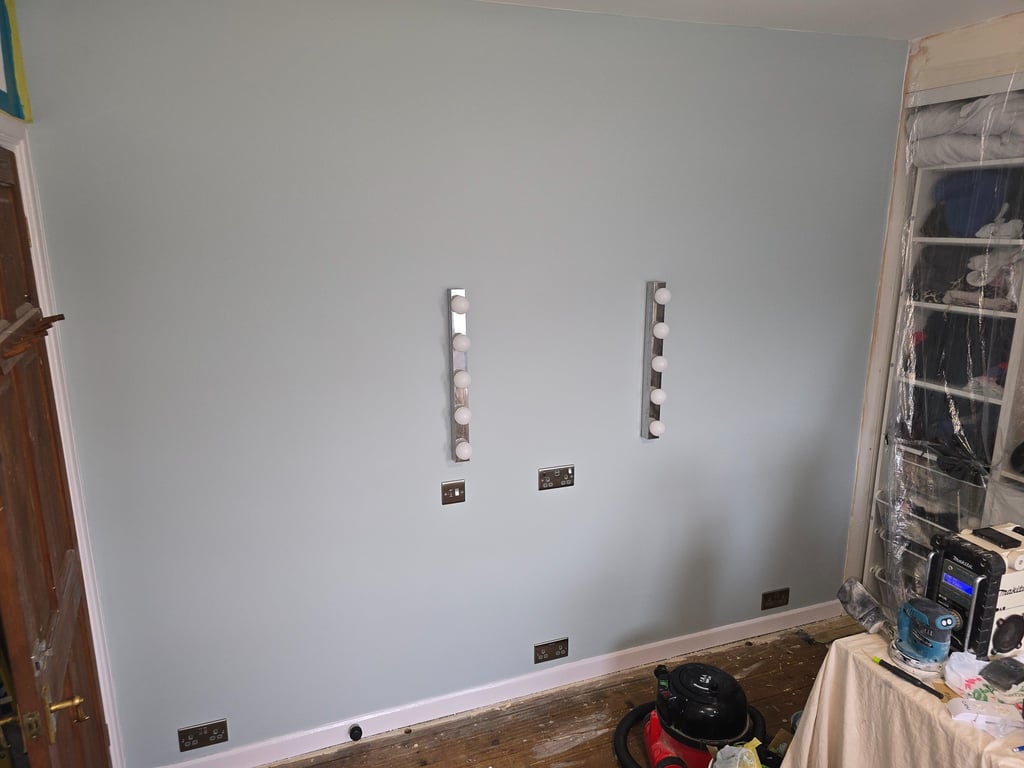 Sockets and vanity lighting installed in a bedroom in Grays by Easy Spark Ltd