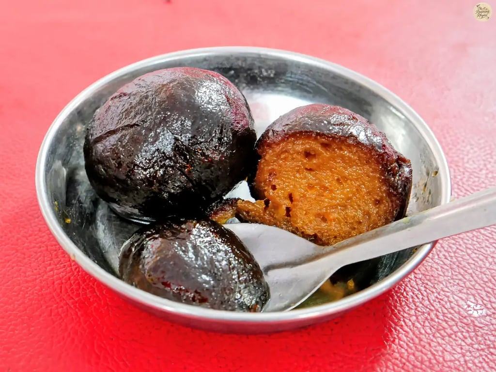 Close-up of delicious Hathijam, a traditional sweet, at Kota Dussehra Mela.