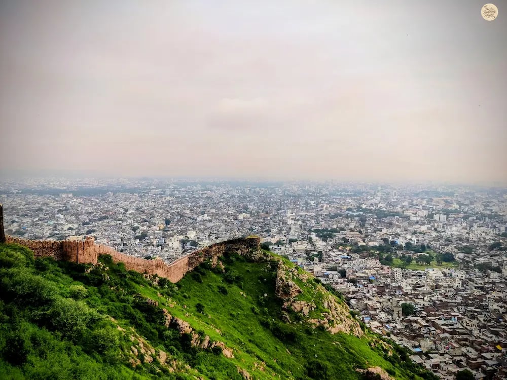 Enjoy the panoramic city view from Nahargarh Fort in Jaipur, a popular sunset spot overlooking the Pink City.