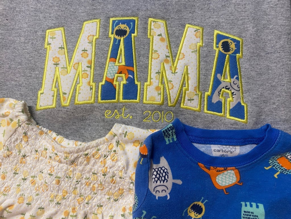 Custom Applique Sweatshirt made of children's onesies.