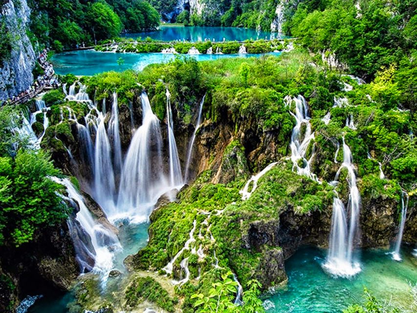 The photo shows amazing nature - a 3 turquoise blue lakes and the amazing waterfalls flowing between them,and greenery around